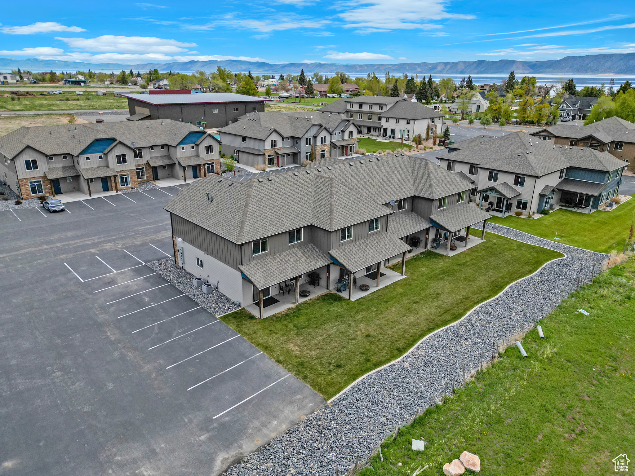 Aerial view of residential area featuring mountains