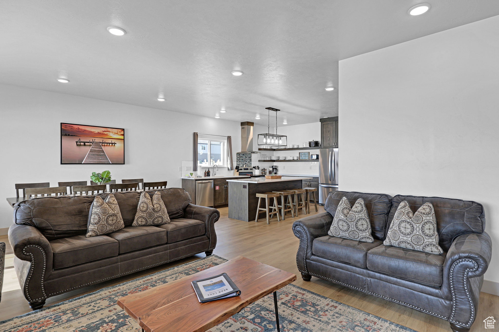 Living room featuring light wood-style floors and recessed lighting