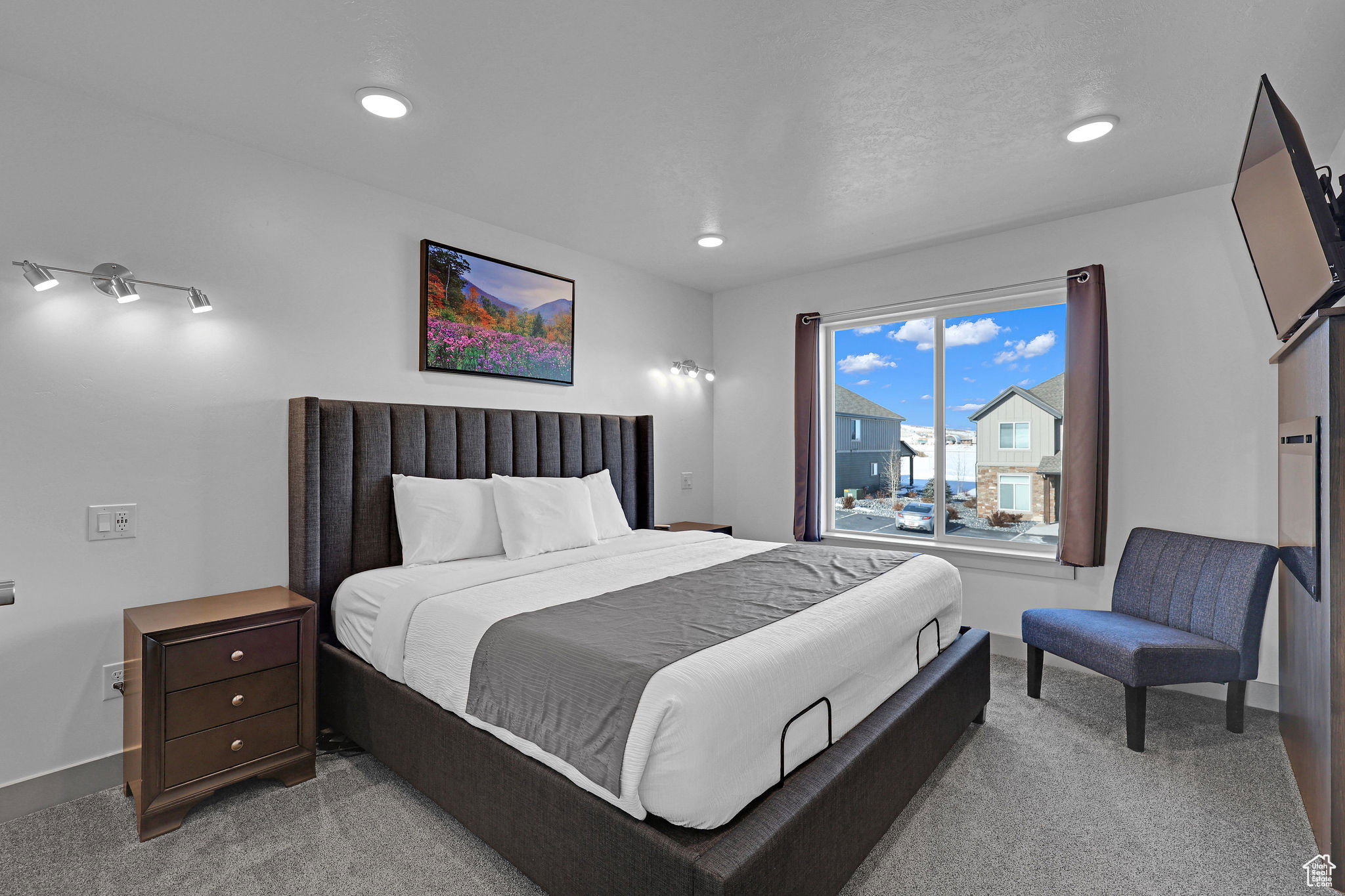 Carpeted bedroom featuring recessed lighting