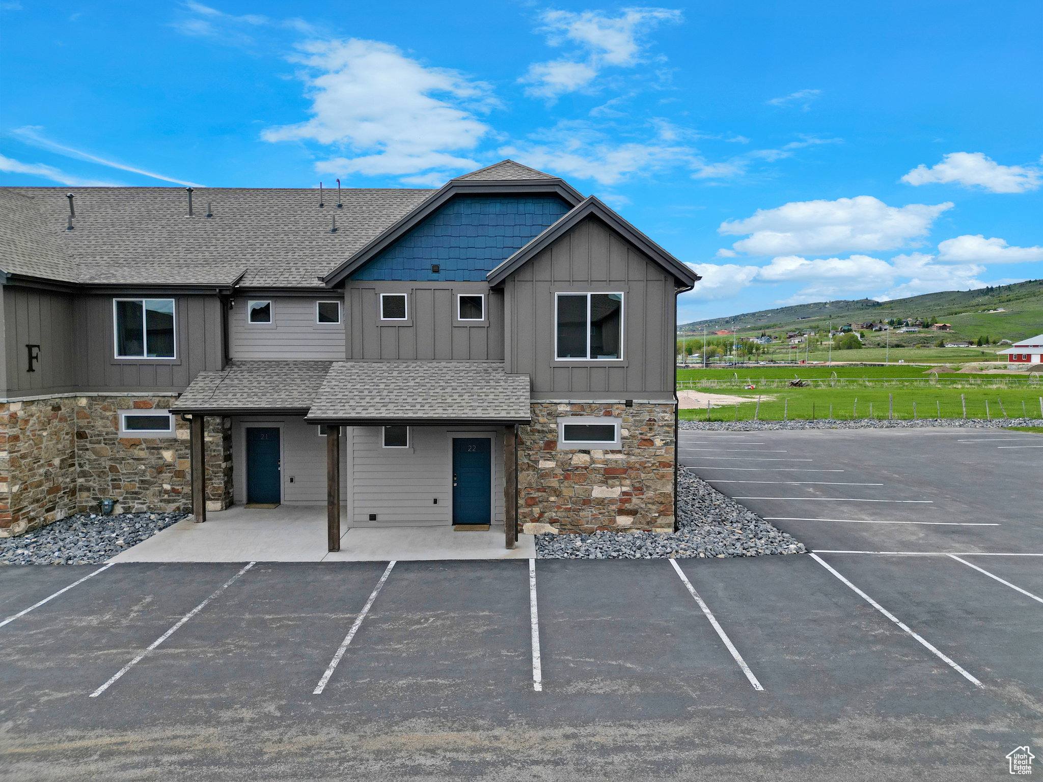 Uncovered parking lot with a mountain view