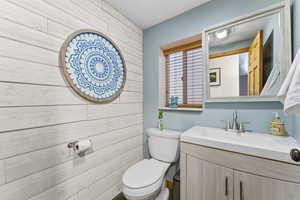 Bathroom with vanity and toilet