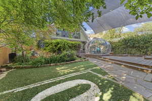 Fenced yard with an exterior structure