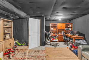 Basement featuring an office area