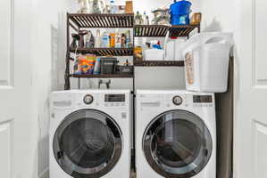 Laundry area featuring separate washer and dryer