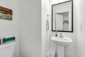 Bathroom featuring toilet and a sink