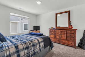Bedroom featuring carpet flooring