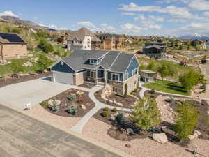 Aerial perspective of suburban area featuring a mountain backdrop
