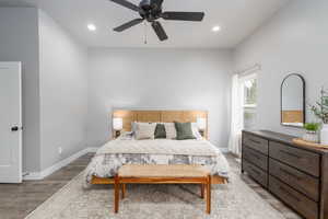 Bedroom with recessed lighting, light wood-type flooring, and ceiling fan