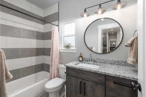 Full bath with vanity and shower / bathtub combination with curtain