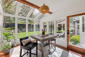 Sunroom featuring tile patterned flooring