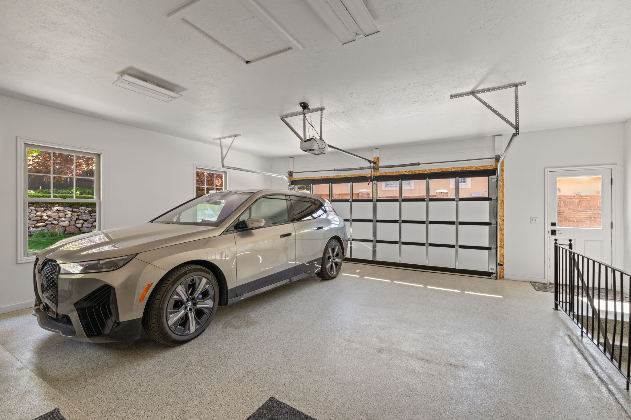 Garage featuring baseboards