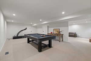 Rec room featuring light colored carpet, pool table, and recessed lighting