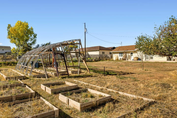 View of yard featuring a vegetable garden