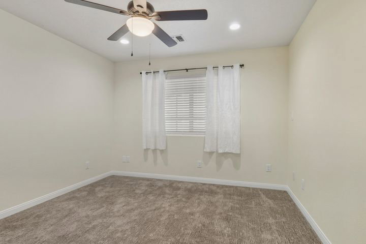 Unfurnished room with carpet floors, ceiling fan, and recessed lighting