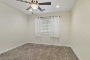 Unfurnished room with carpet floors, ceiling fan, and recessed lighting