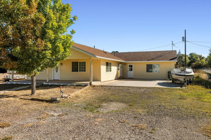 Back of property with a patio area