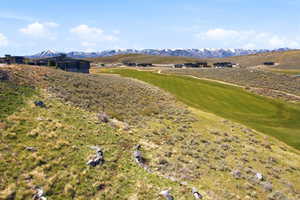 View of mountain backdrop with a local golf course