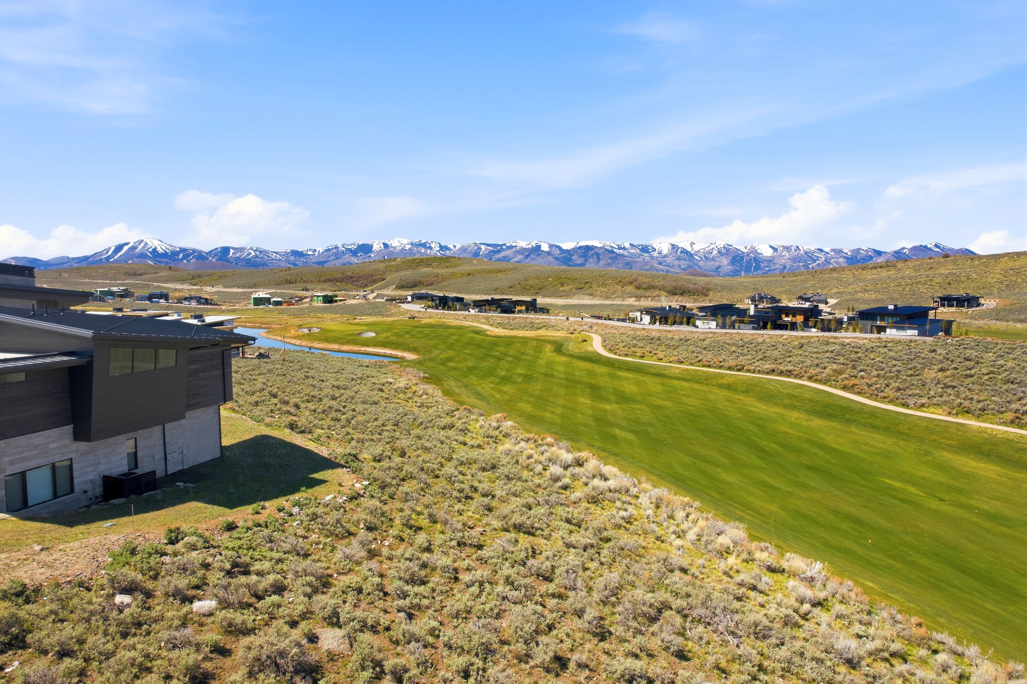 View of mountain backdrop featuring a golf course