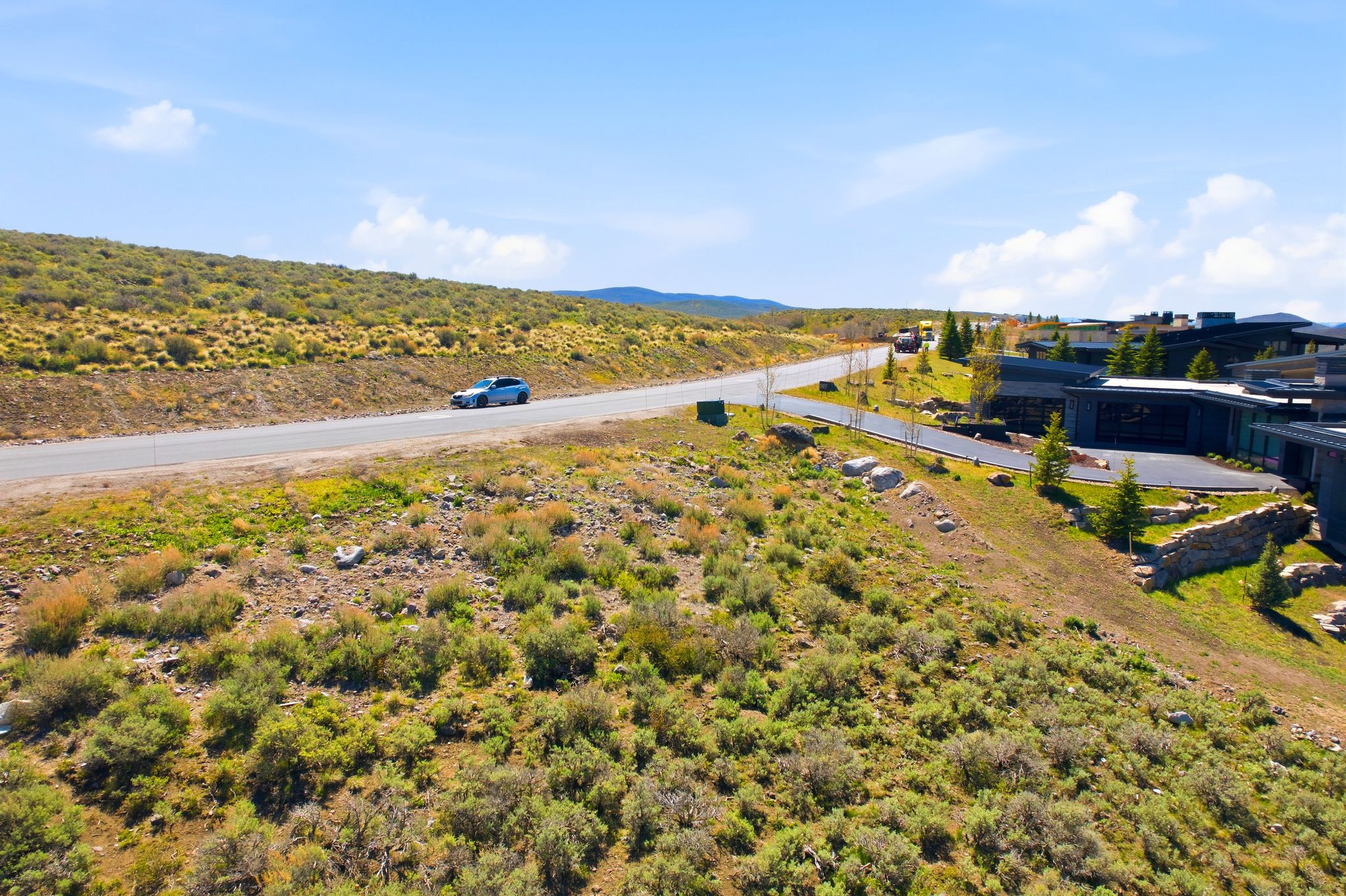 Drone / aerial view of a mountainous background