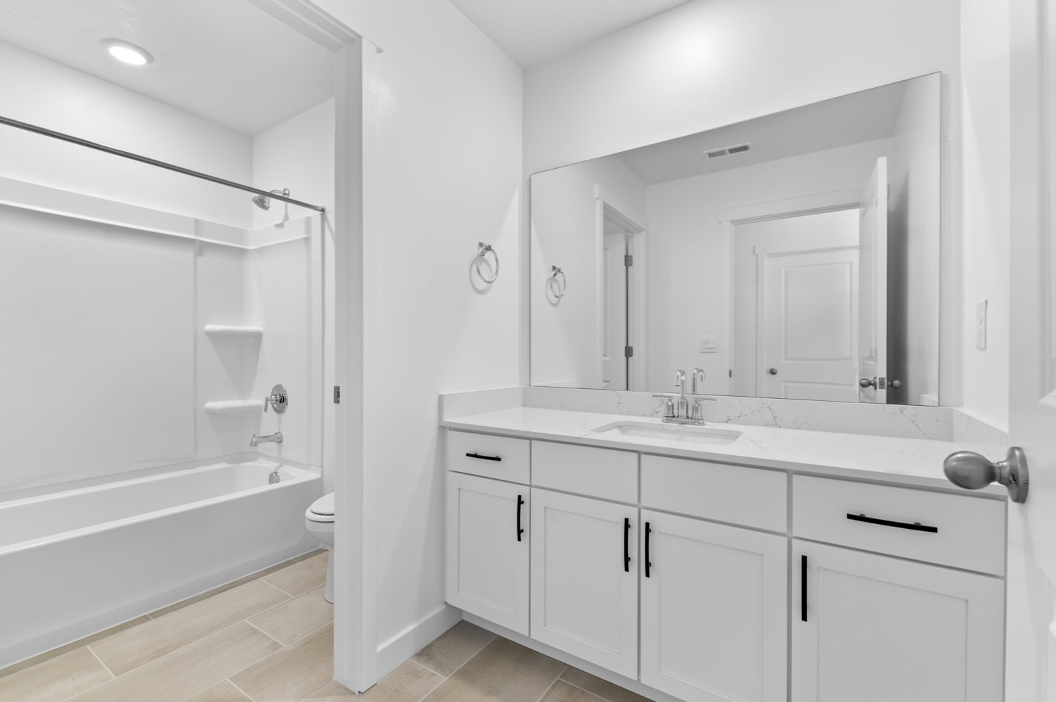 Full bathroom with vanity and shower / washtub combination