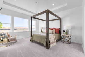 Carpeted bedroom with baseboards and recessed lighting