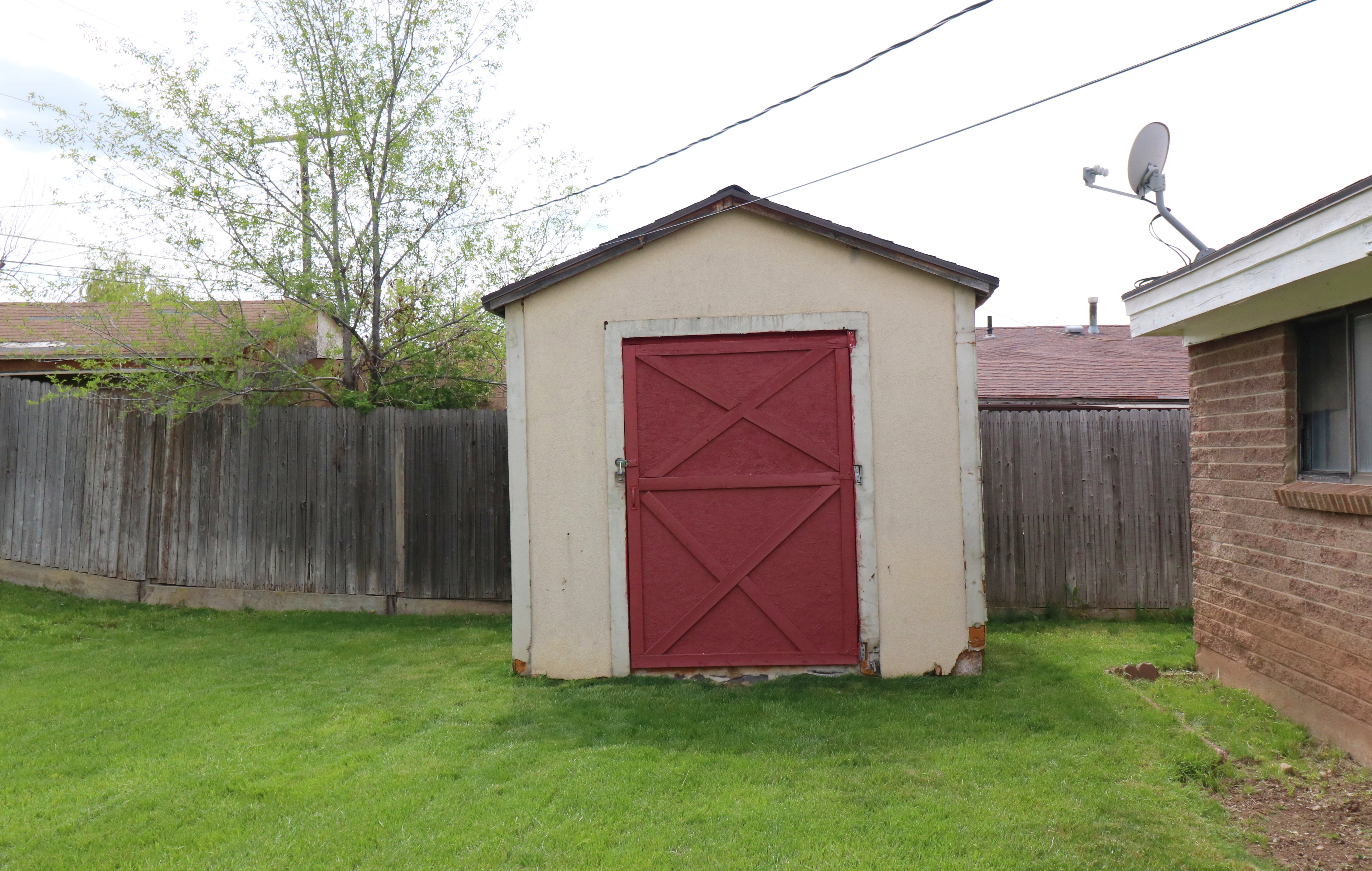 View of shed featuring a fenced backyard