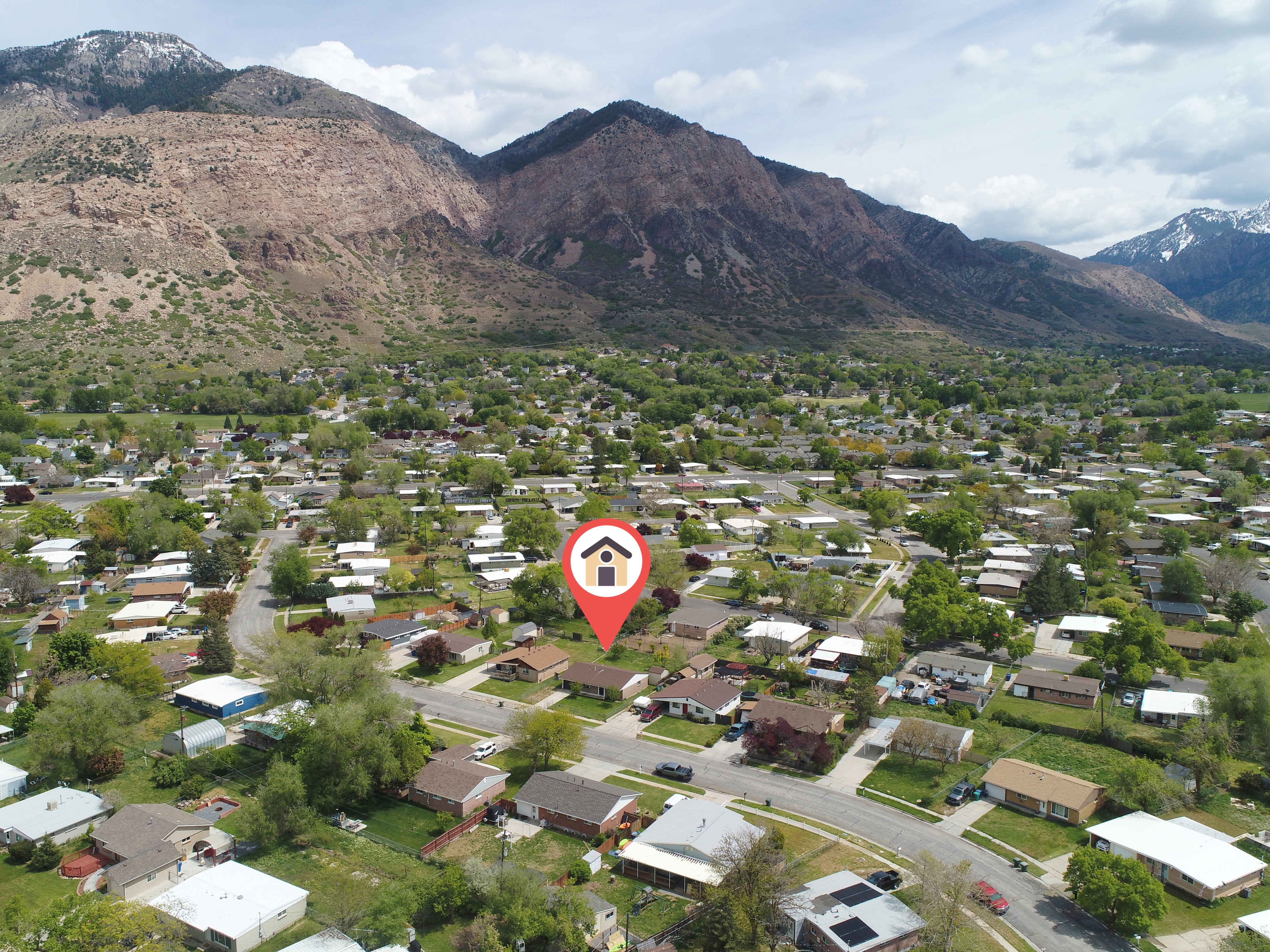 Aerial perspective of suburban area featuring mountains