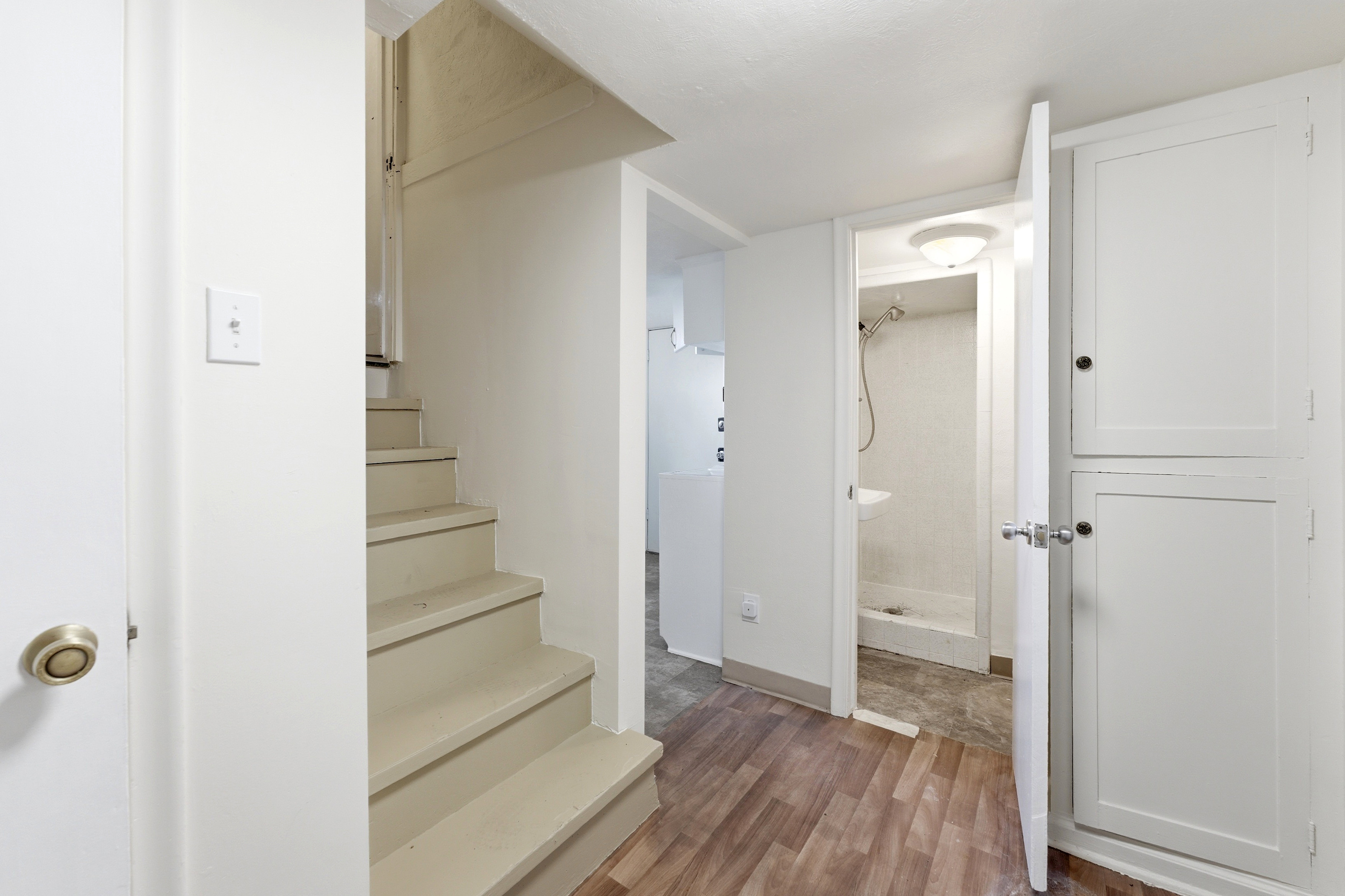 Stairway with wood finished floors