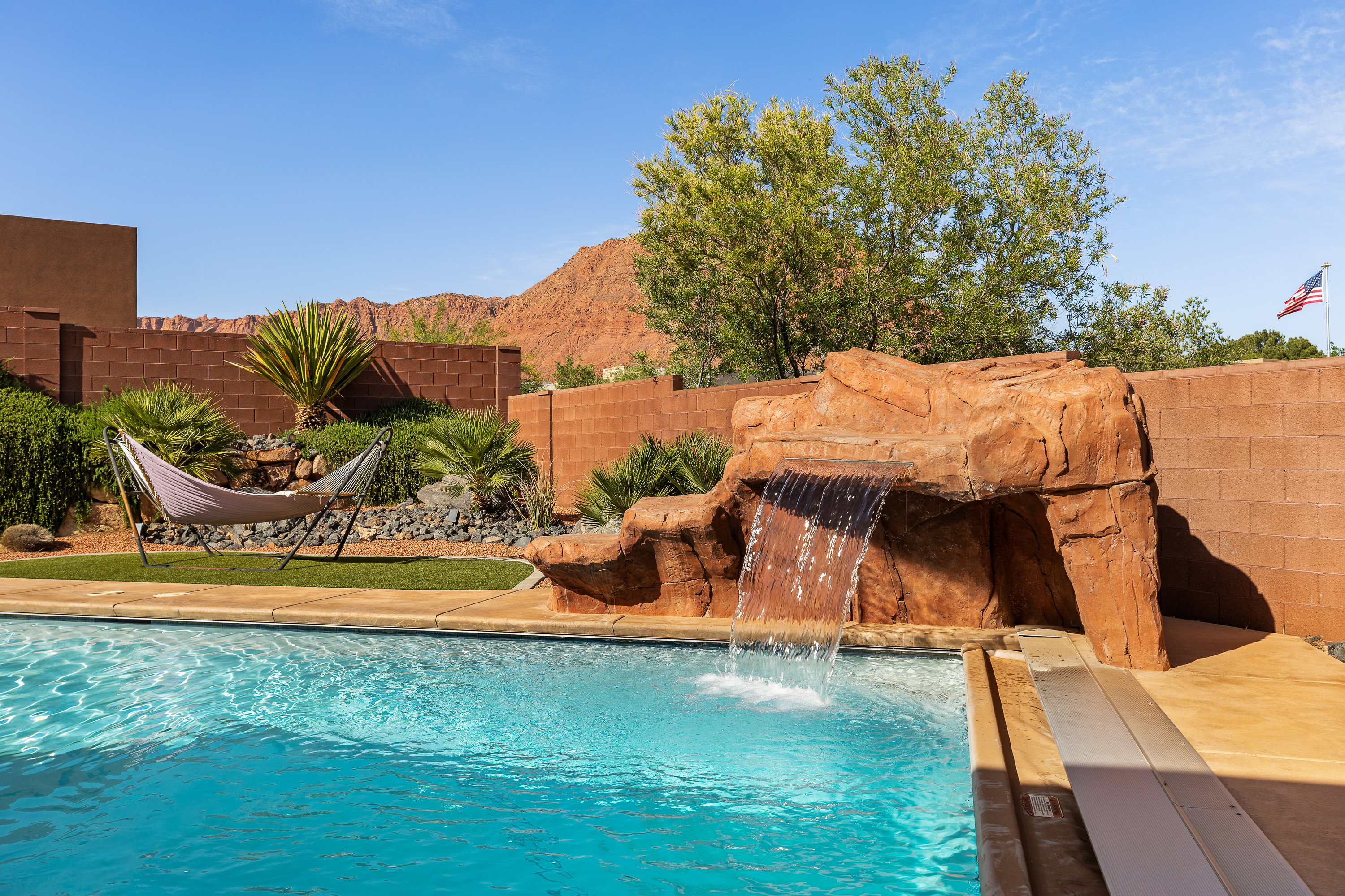 View of pool featuring a fenced backyard