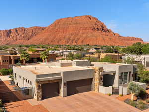 Mountain view featuring nearby suburban area