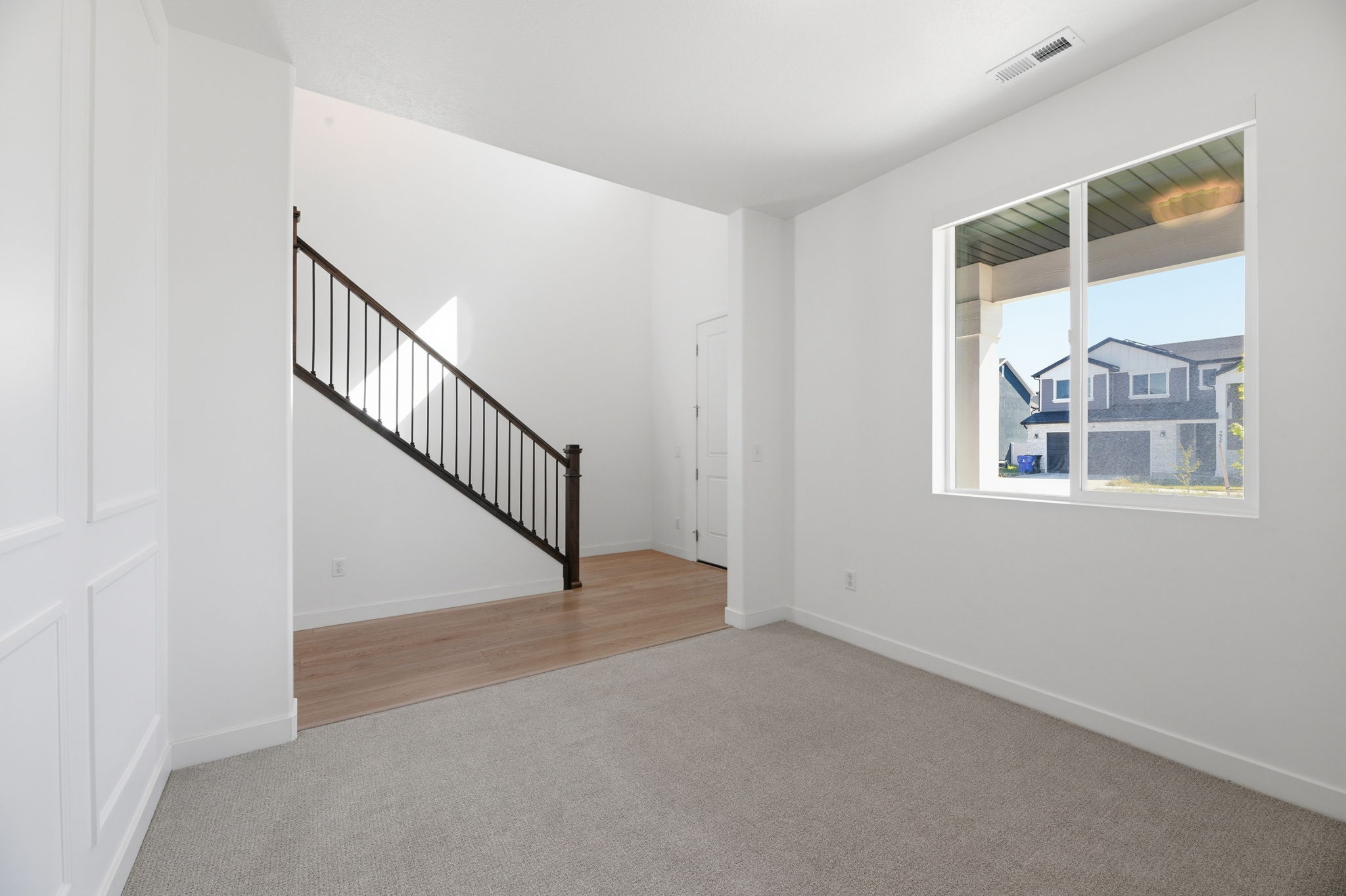 Living Room or Office/Den w/Beautiful Staircase view