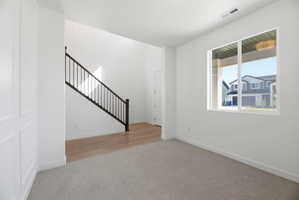 Living Room or Office/Den w/Beautiful Staircase view