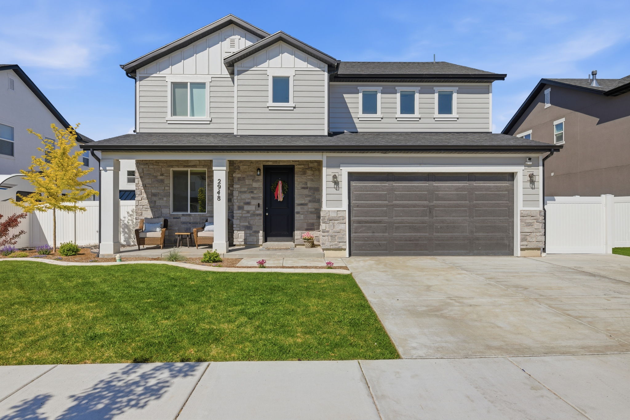 Beautiful Front View of the Home Fully Landscaped w/Extra Parking Area