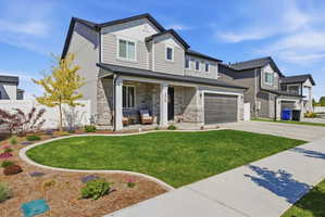 Beautiful Front View of the Home Fully Landscaped w/ Extra Parking Area