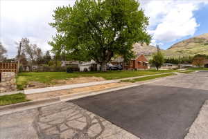 View of front of house with a residential view and a mountain view