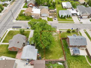 Aerial perspective of suburban area with property boundaries highlighted