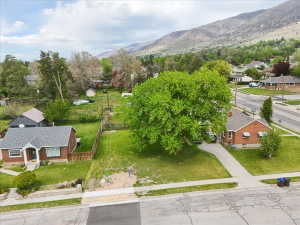 View of subject property featuring a mountainous background