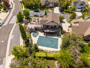Aerial view of residential area featuring a pool area