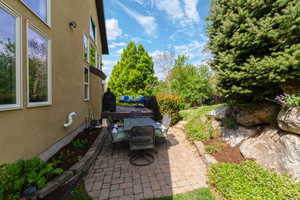 View of patio / terrace featuring outdoor dining area and a deck