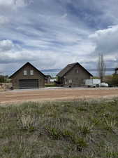 View of the front of the house, garage and driveway