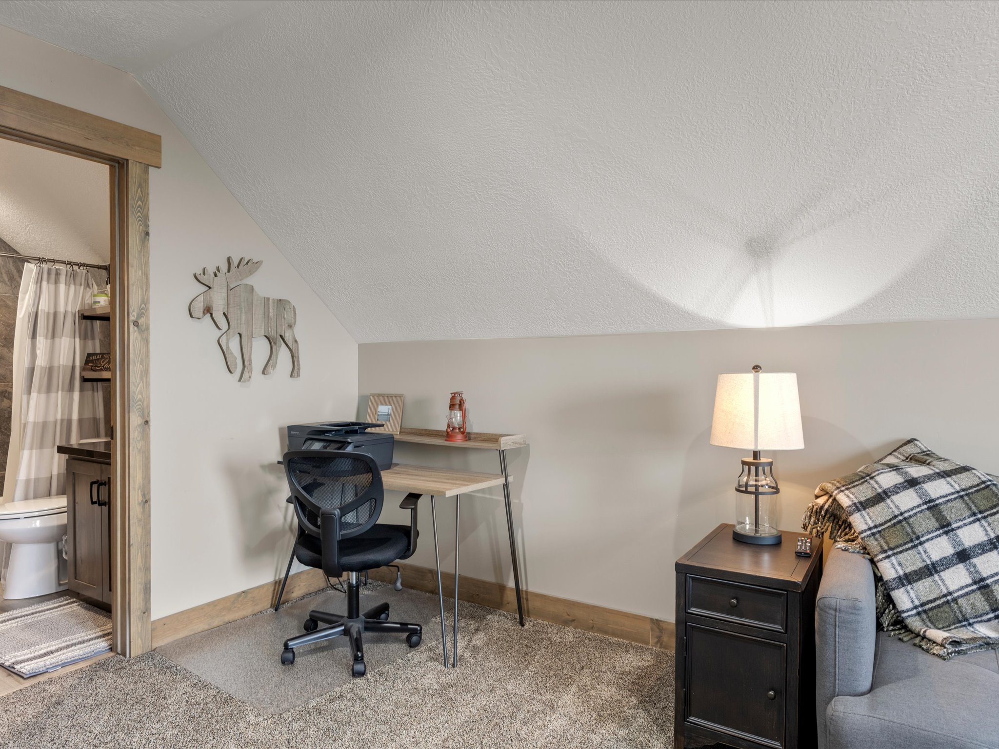 Office featuring carpet and baseboards