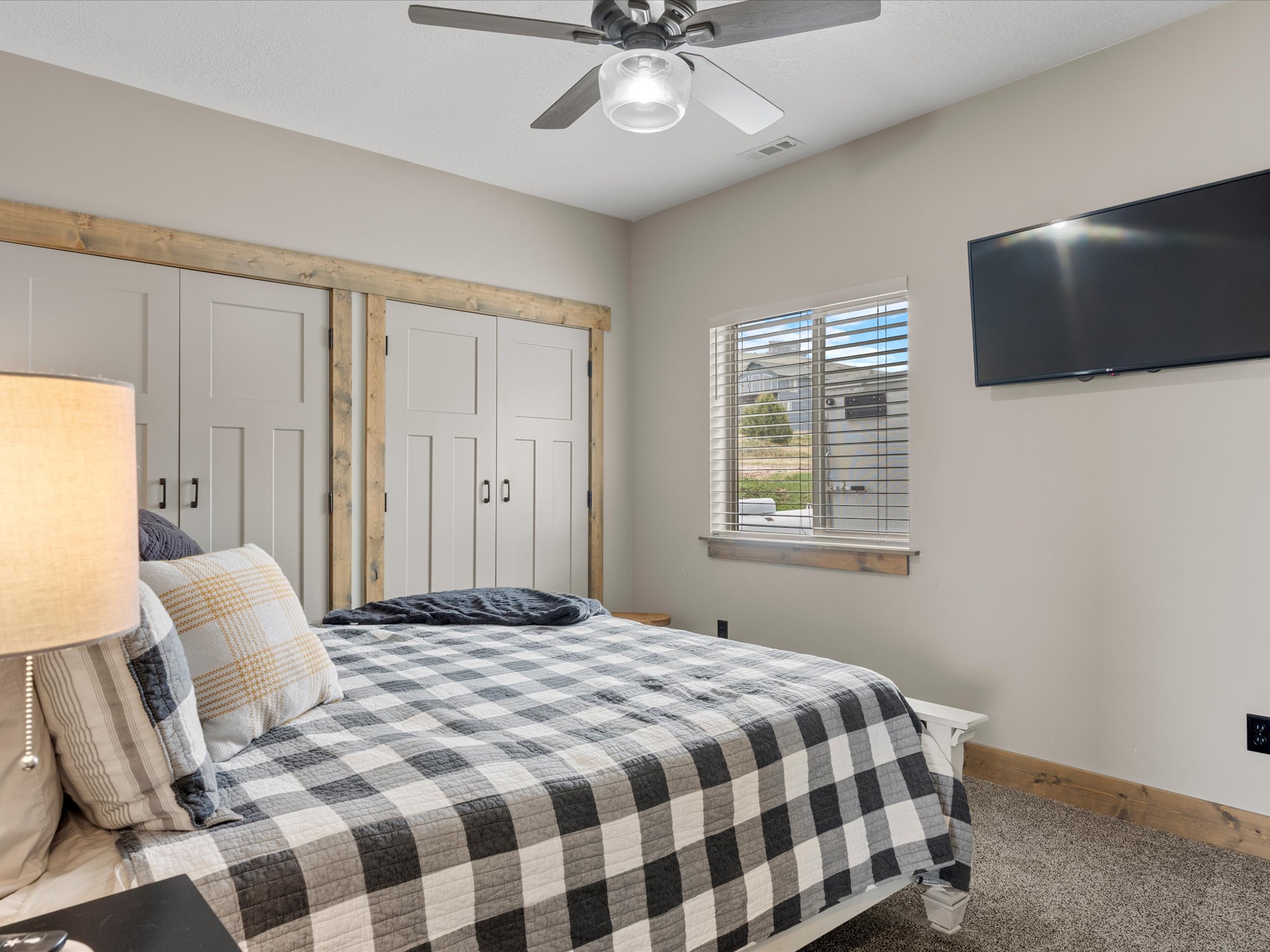 Bedroom featuring baseboards and a ceiling fan