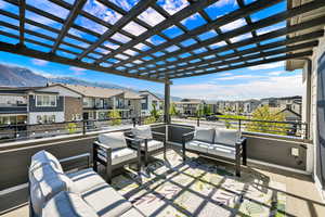 View of patio with an outdoor hangout area and a residential view