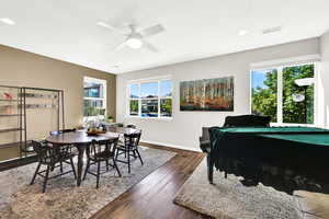 Another view of this multifunctional great room. Showing the healthy amount of natural light.