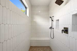 Bathroom featuring tiled shower