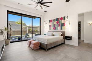 Bedroom with access to outside and a ceiling fan