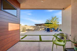 Fenced backyard with a patio area