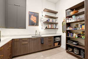 Kitchen with modern cabinets and a sink