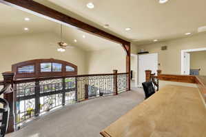 Hall featuring light colored carpet and recessed lighting