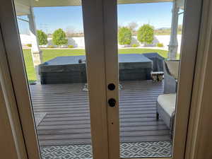 Doorway featuring plenty of natural light and french doors